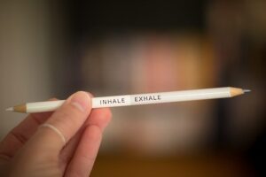 pencil that says "inhale, exhale"